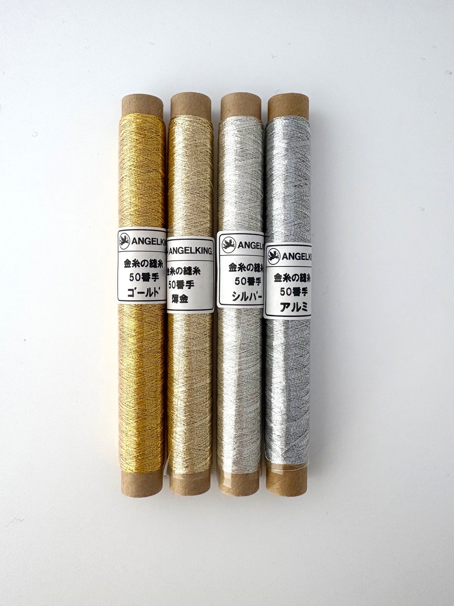 50wt gold metallic thread, cigarette spool, 50m